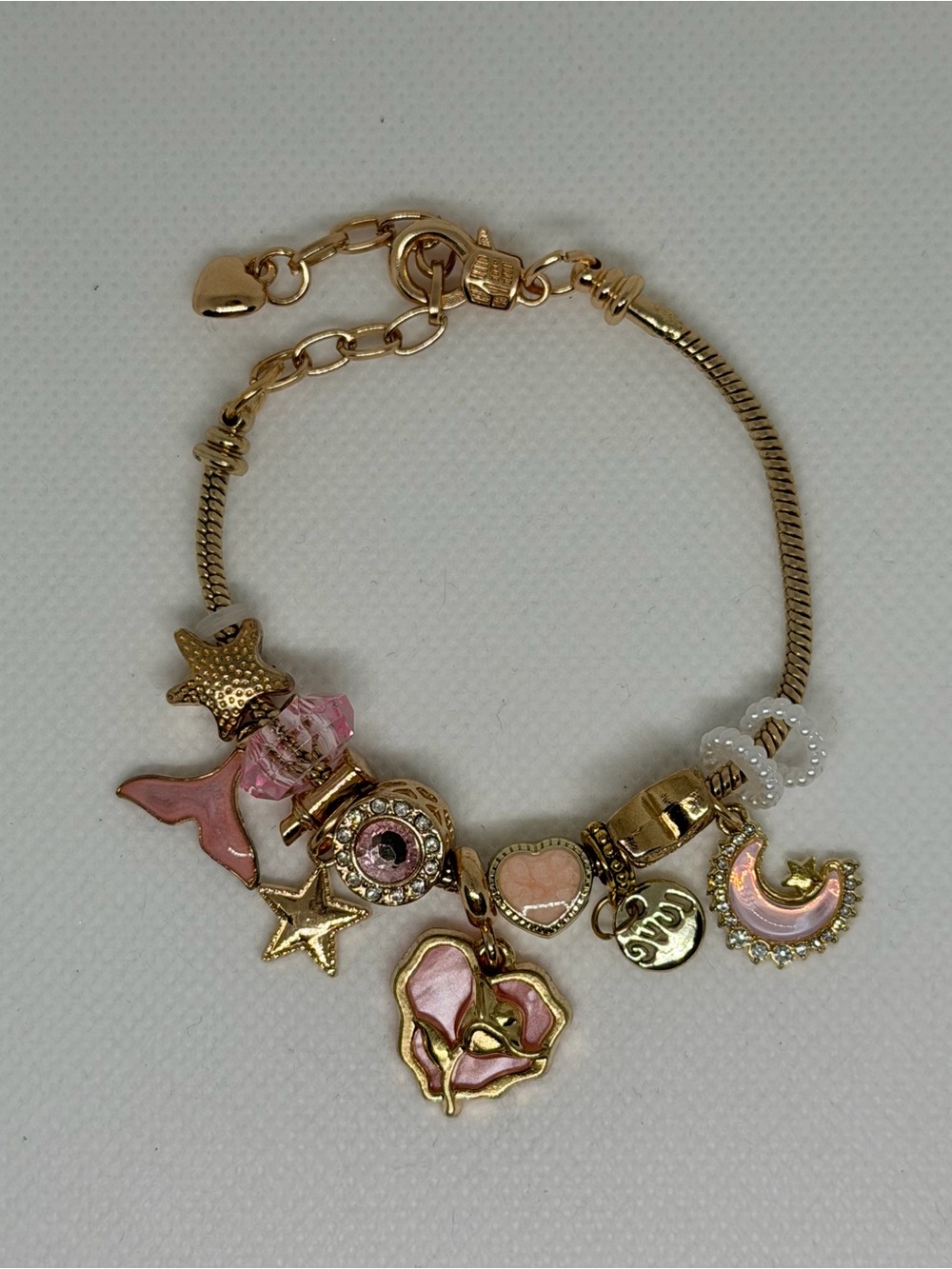 Gold-Tone Pink Charm Bracelet with Hearts & Stars